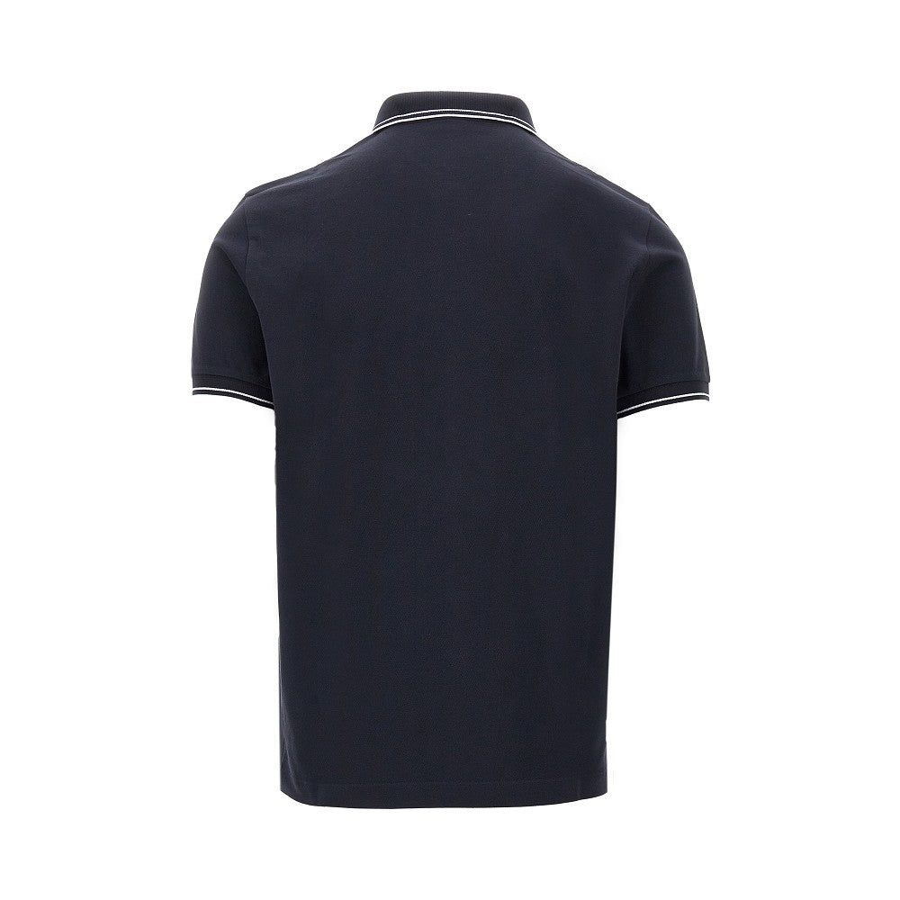Polo in piquet stretch con patch logo