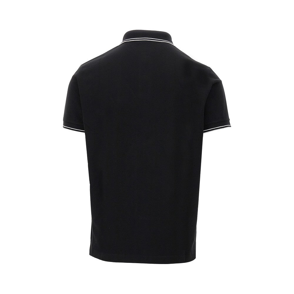 Polo in piquet stretch con patch logo
