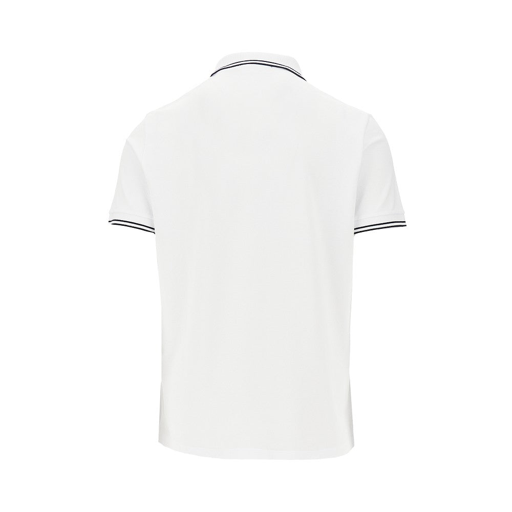 Polo in piquet stretch con patch logo