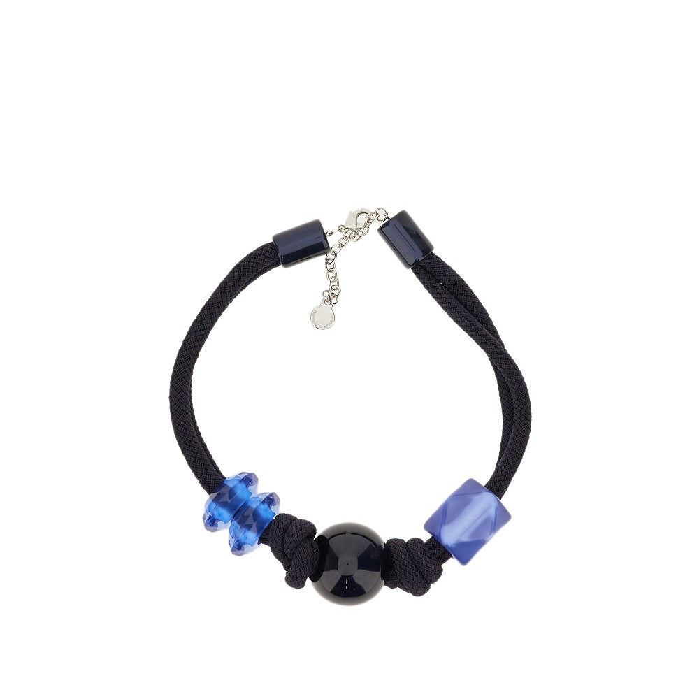 Cord necklace with maxi beads