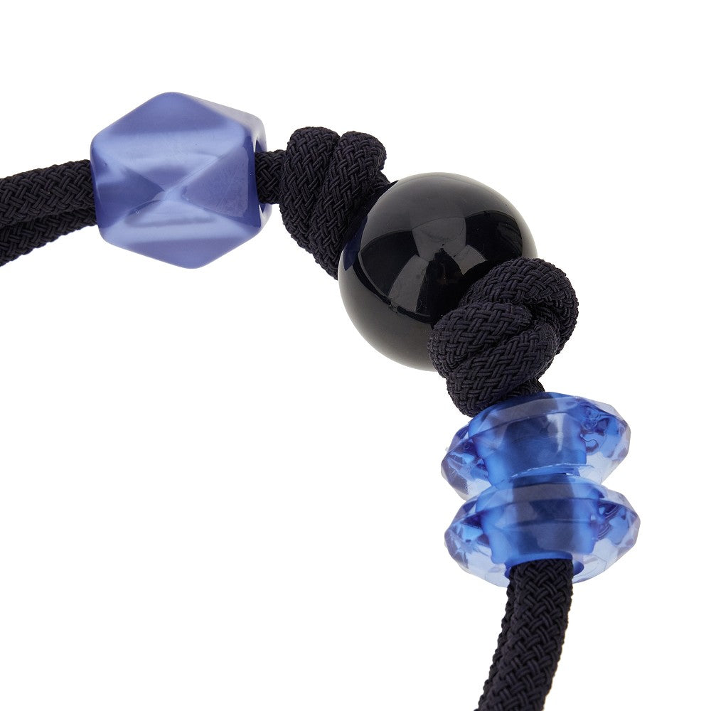 Cord necklace with maxi beads