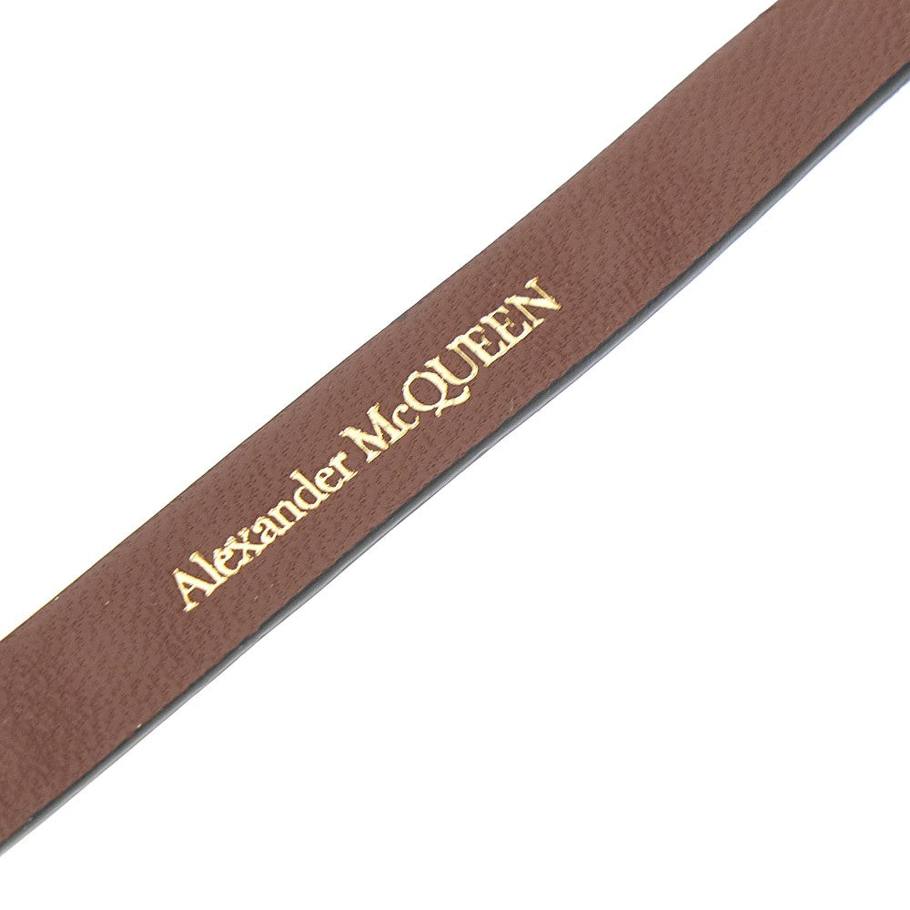 Leather bracelet with studs and Skull