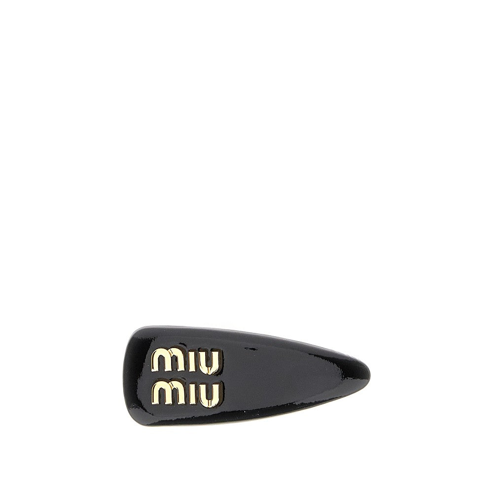 Patent leather hair clip with logo