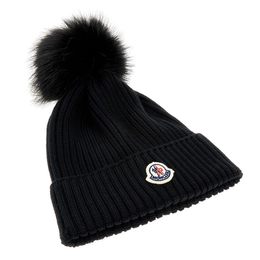 Beanie con pompon in finta pelliccia