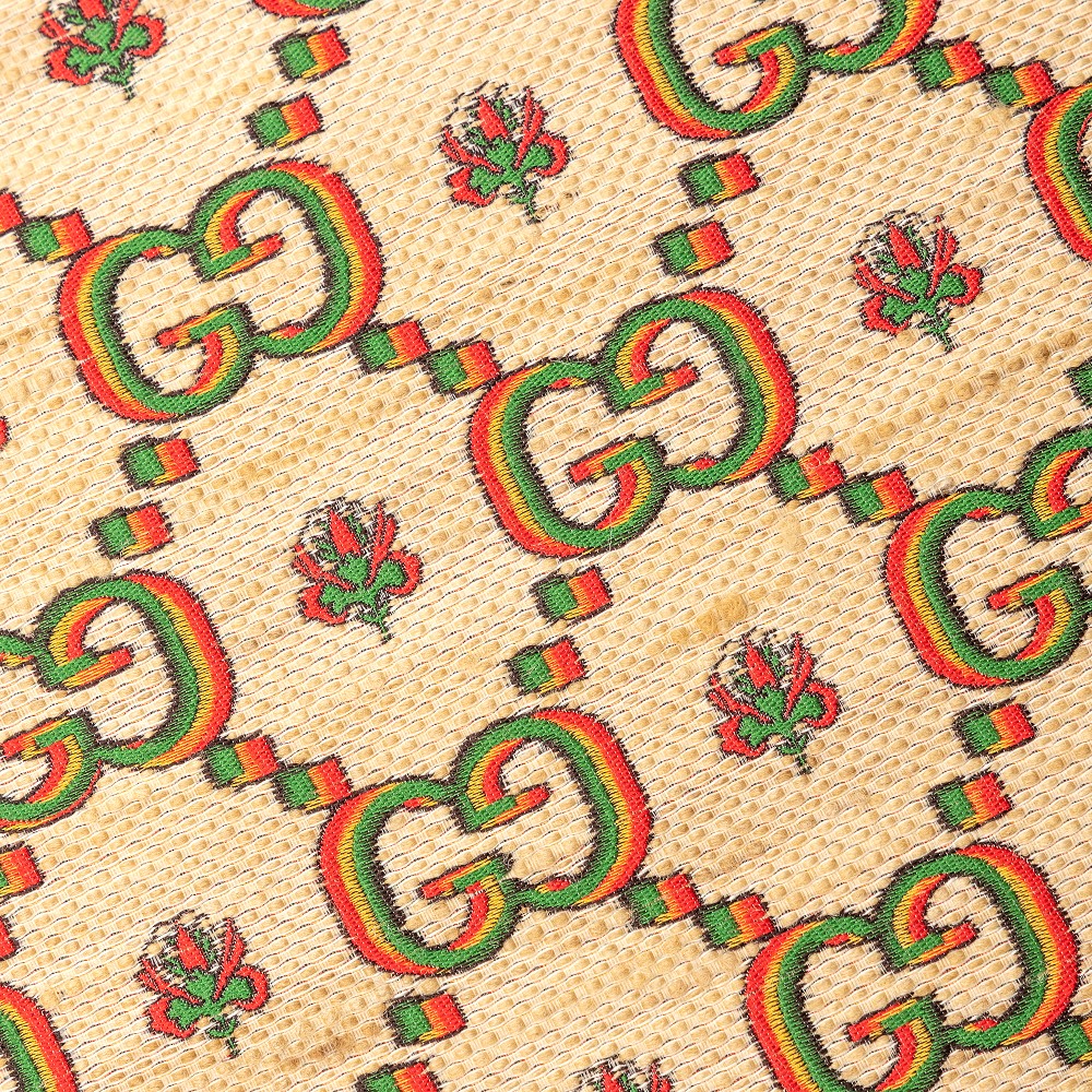 Cuscino beige con pattern logo GG