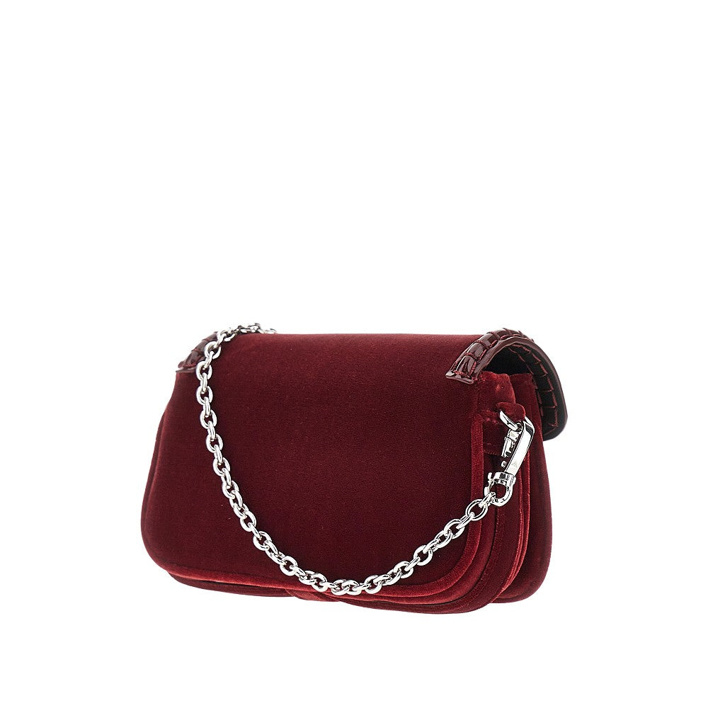 Velvet and faux patent leather clutch