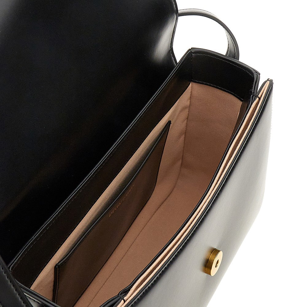 Eagle buckle leather bag