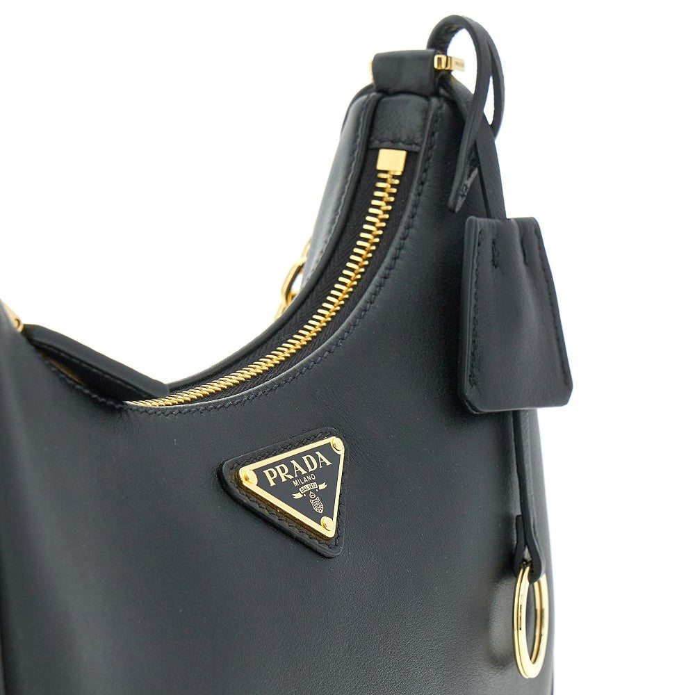 Mini borsa Prada Re-Edition in nappa