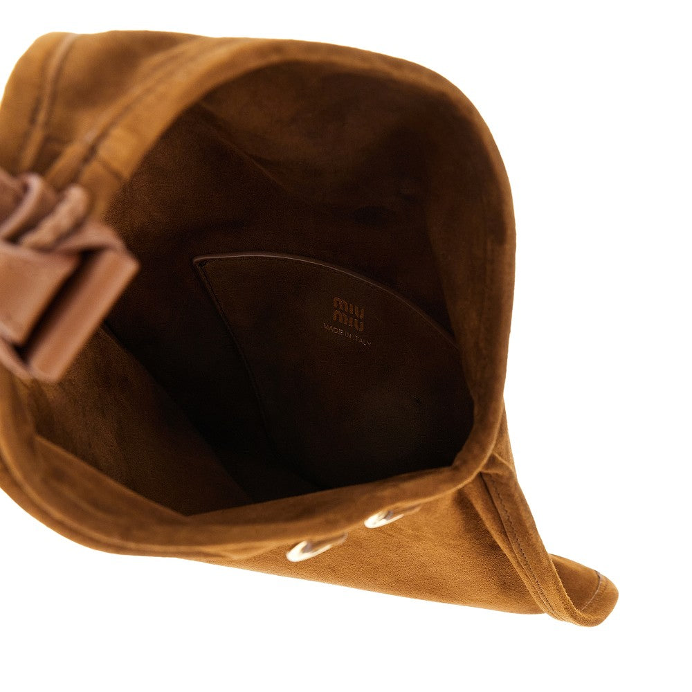 Borsa in pelle scamosciata con nappine