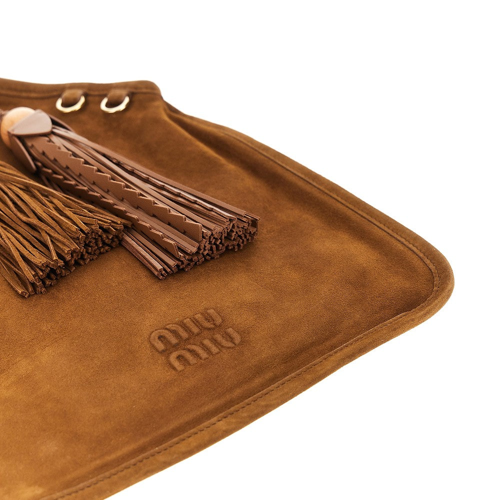 Borsa in pelle scamosciata con nappine