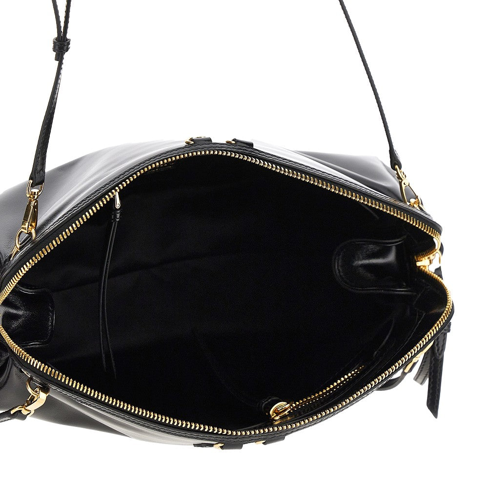 Pochette in pelle lucida con tracolle
