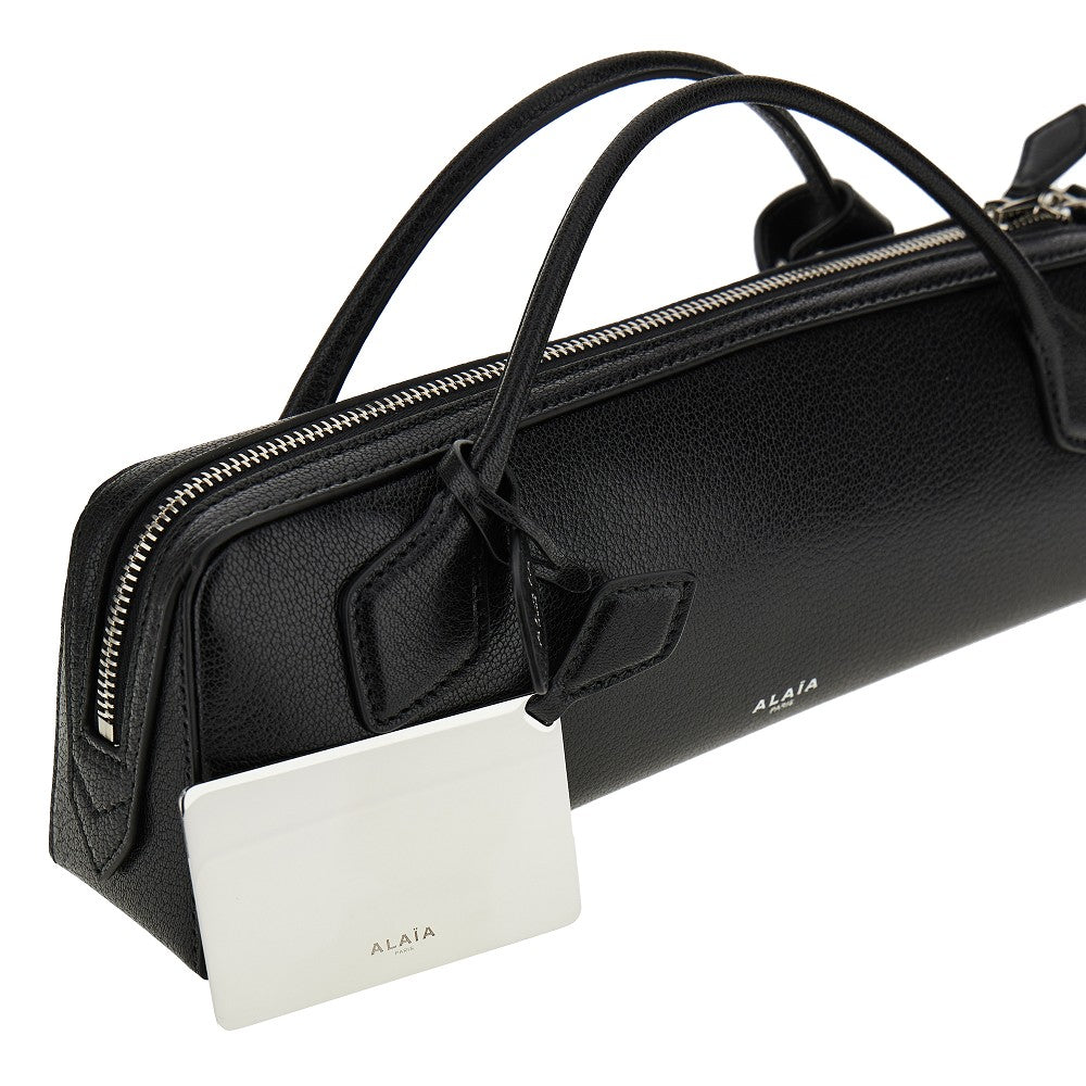 Grained leather 'Le Teckel' clutch