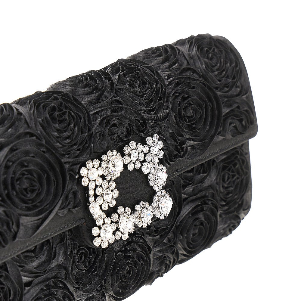 Satin clutch with floral details