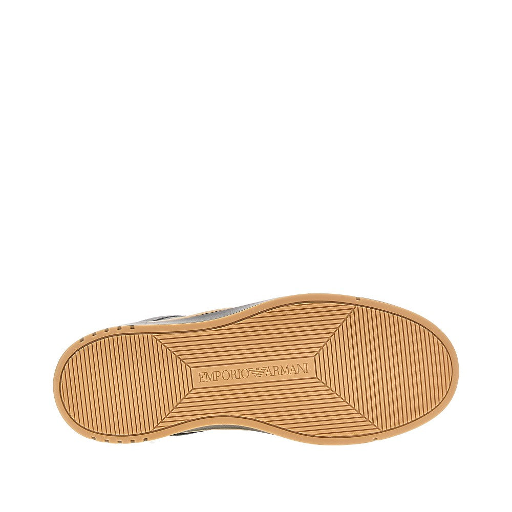 Sneakers in pelle con guardolo a contrasto