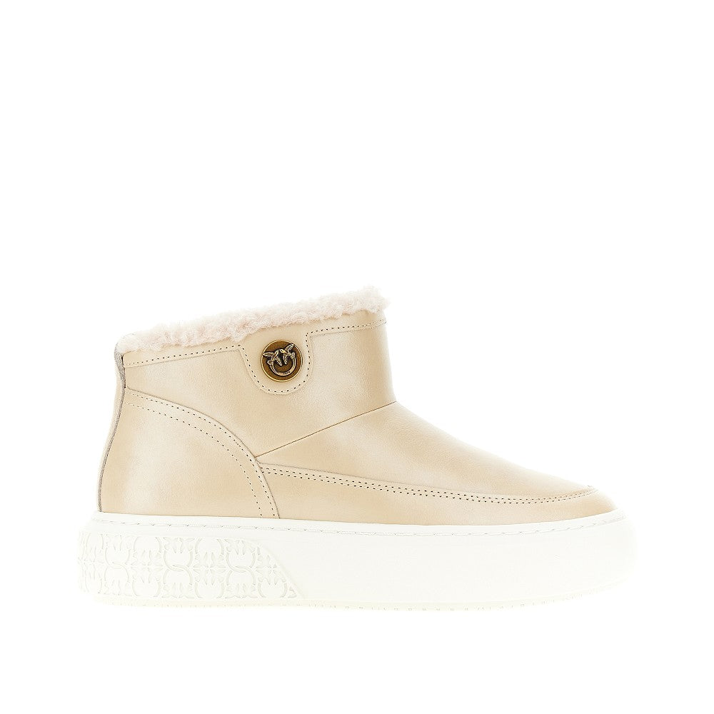 Laminated leather ankle boots