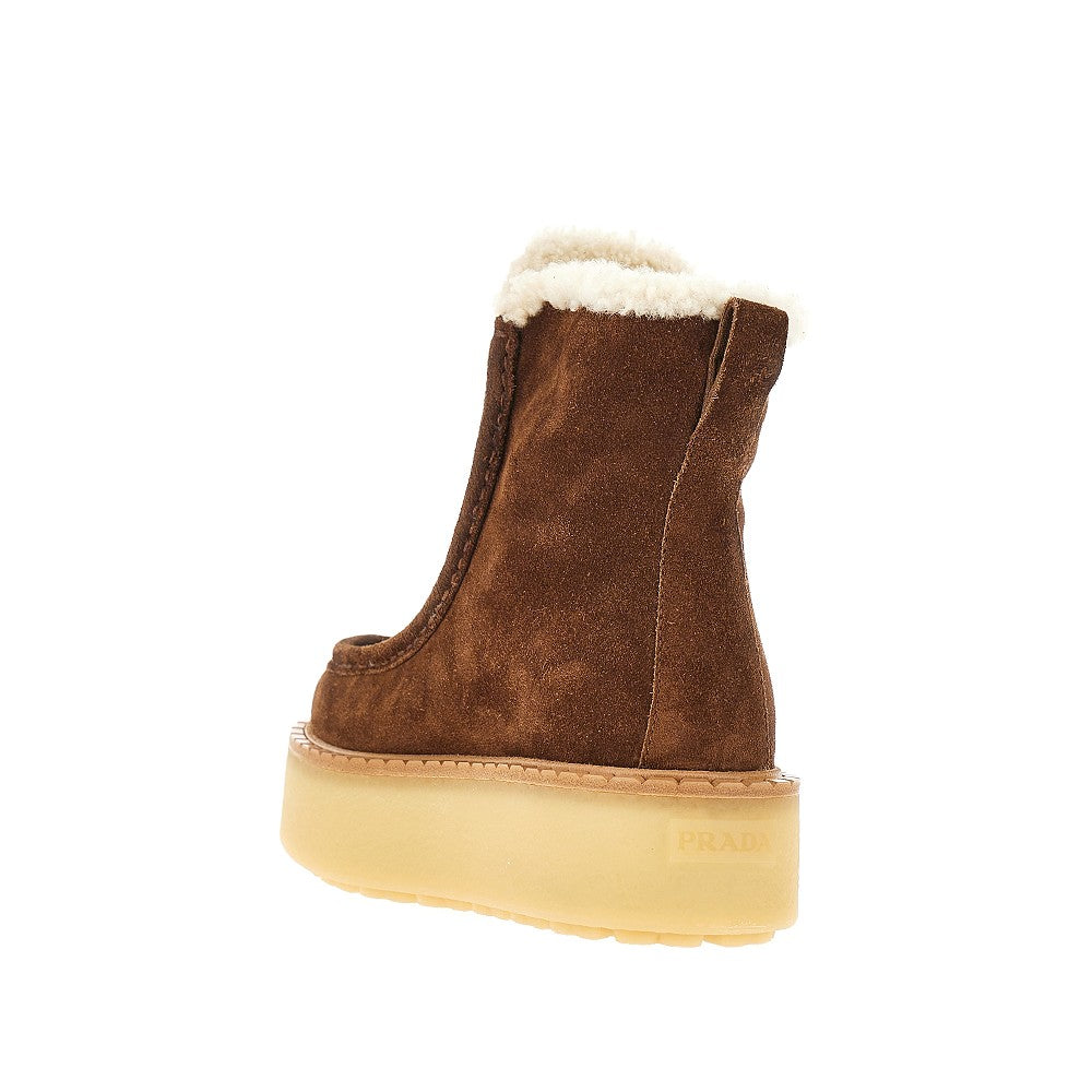 Stivaletti in pelle scamosciata e shearling