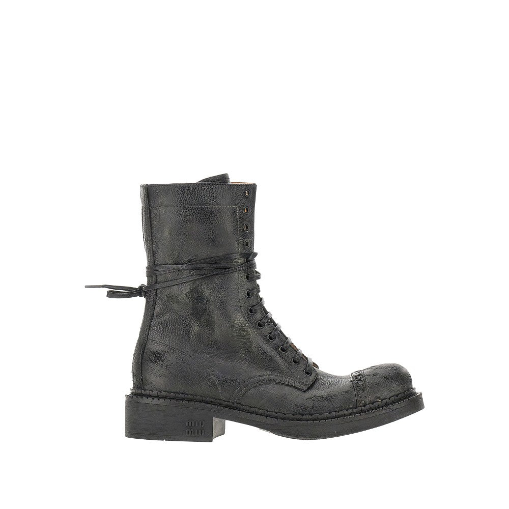 Antiquated leather lace-up boots