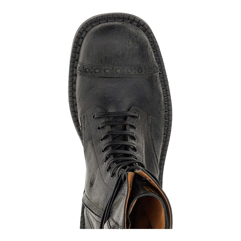 Antiquated leather lace-up boots