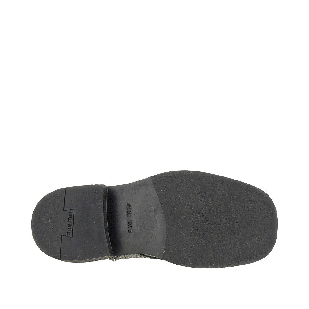 Antiquated leather lace-up boots