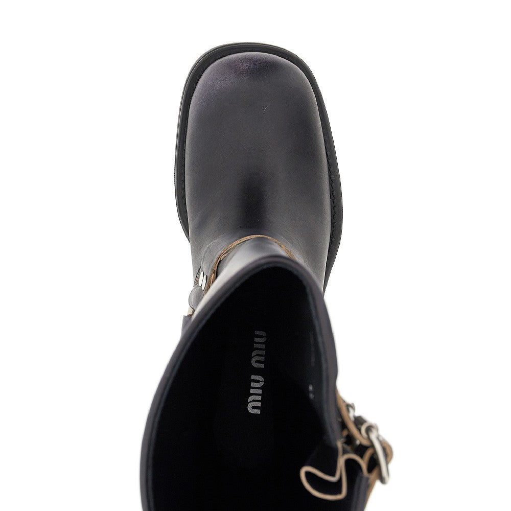 Leather boots with buckles