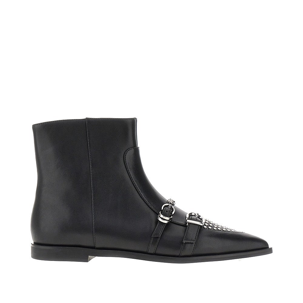 Leather boots with studs and straps
