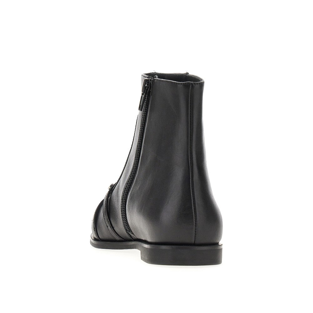 Leather boots with studs and straps
