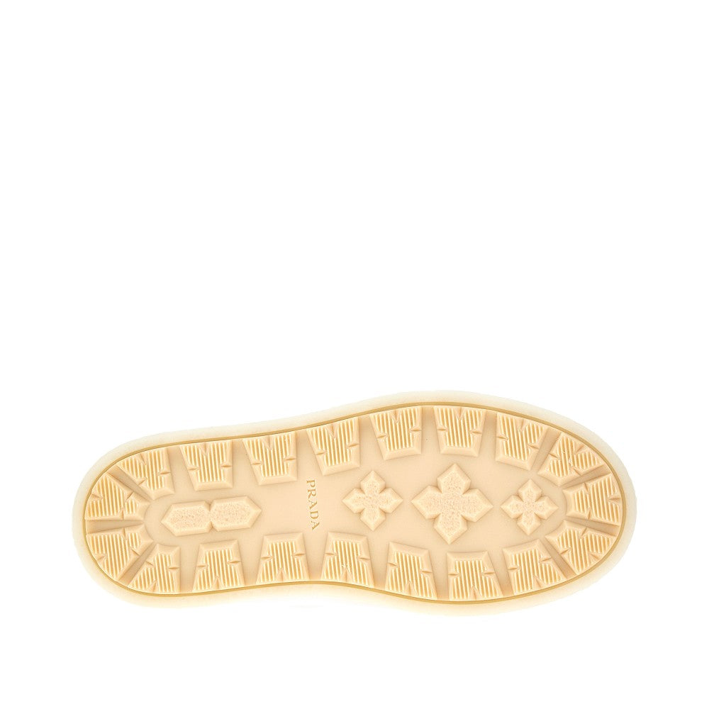 Shearling sabot with triangle logo