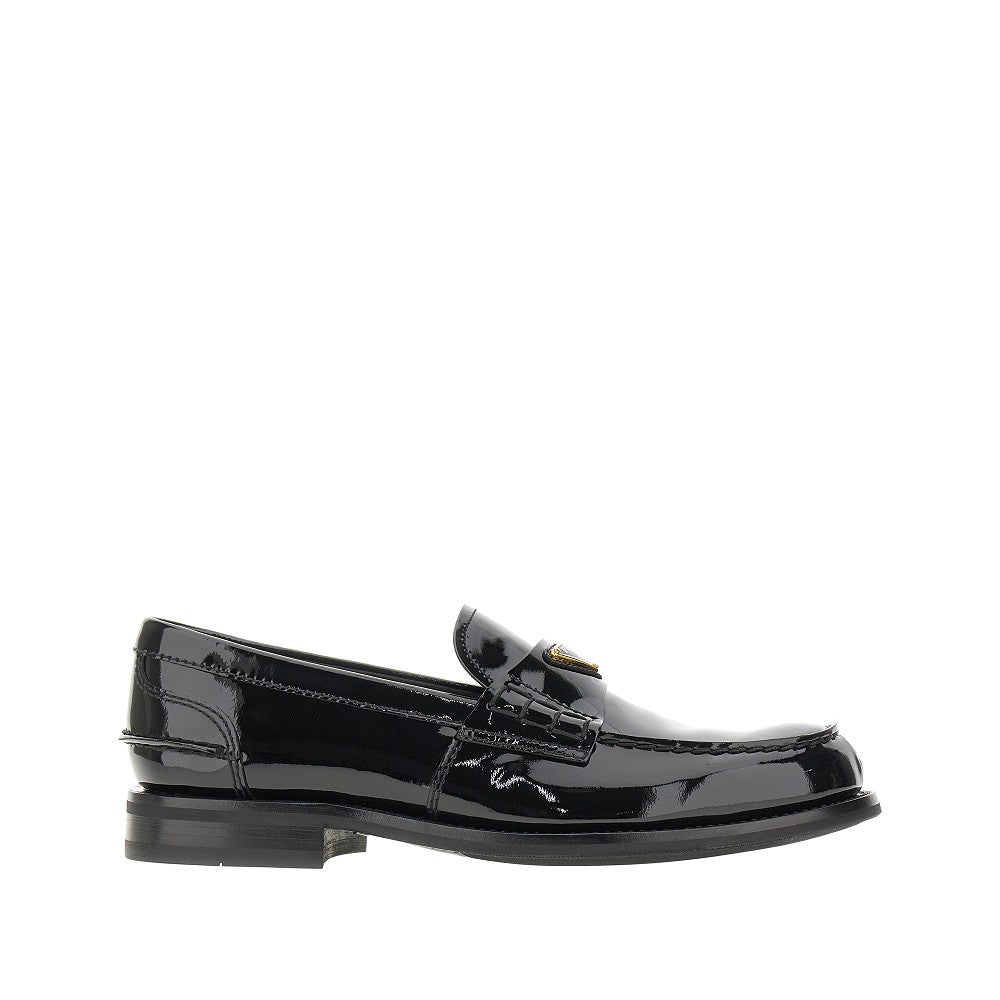 Patent leather loafers with triangle logo