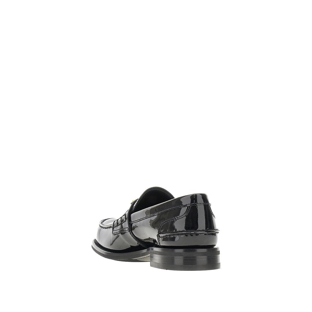 Patent leather loafers with triangle logo