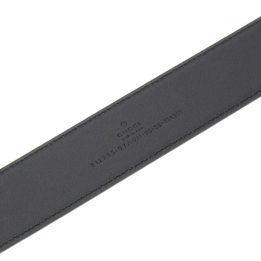 Leather belt with engraved buckle