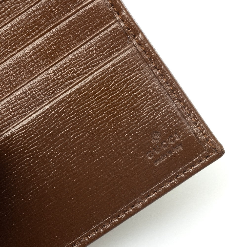 Portafoglio bi-fold in tessuto GG Supreme