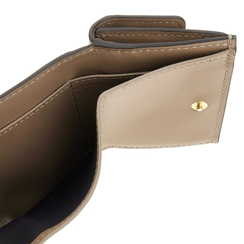 Micro portafoglio trifold Baguette