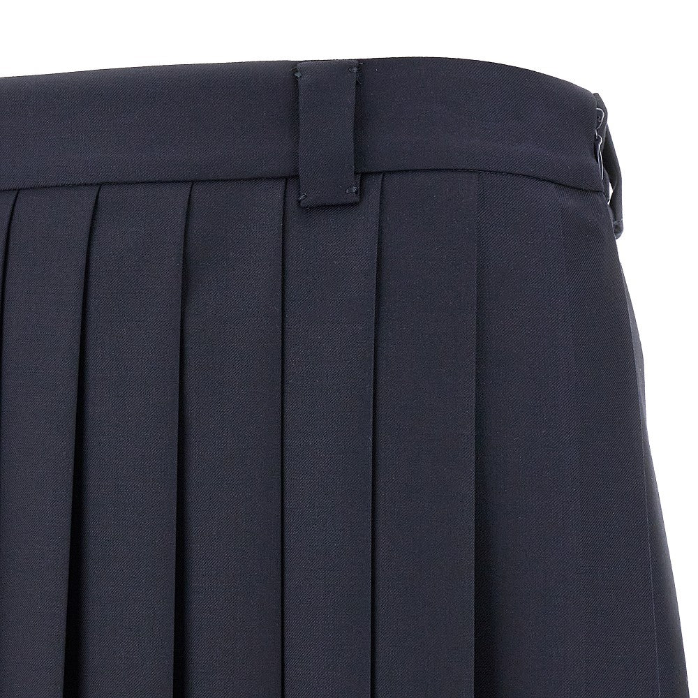 Pleated mini skirt with logo patch