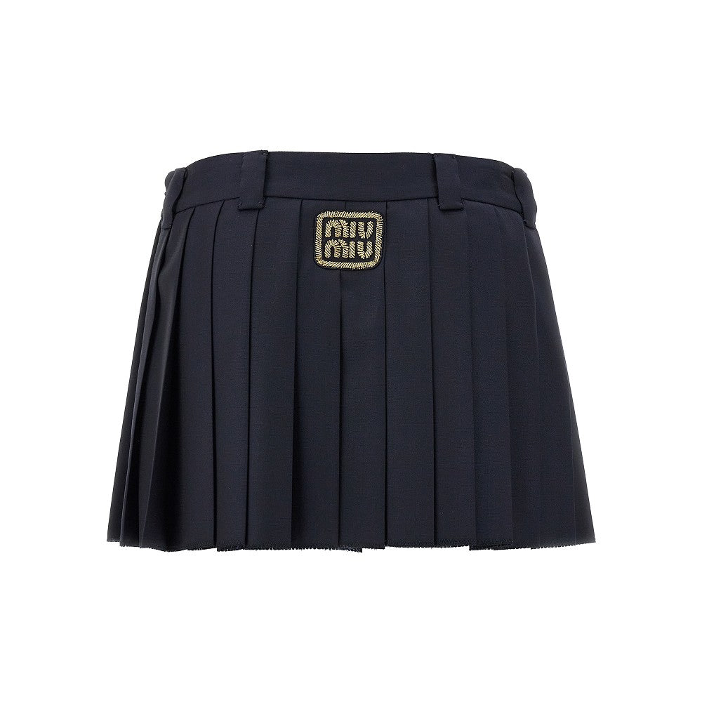 Pleated mini skirt with logo patch