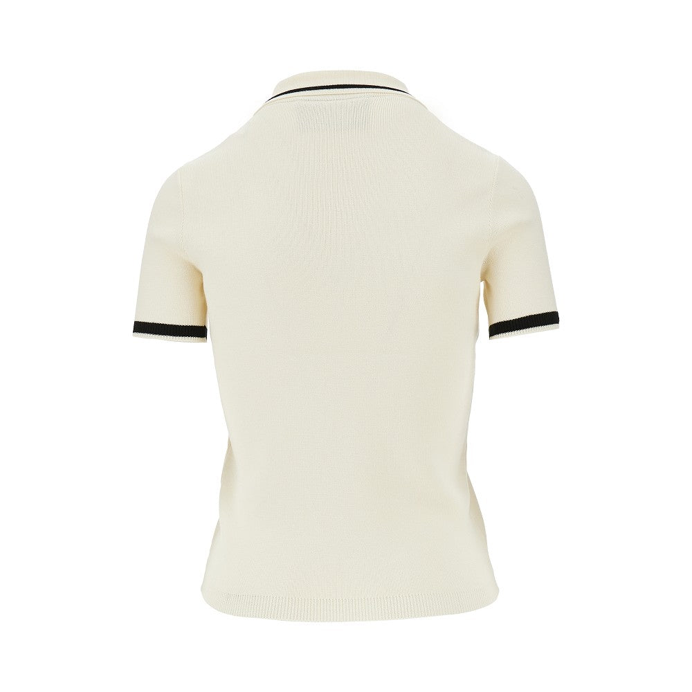 Polo in cotone con intarsio V