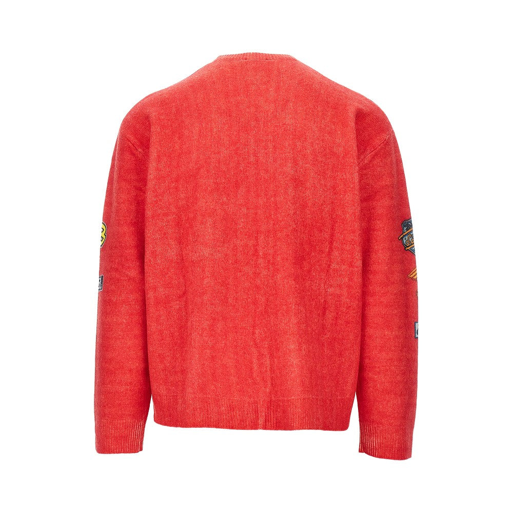 Pullover in lana con patch stampati