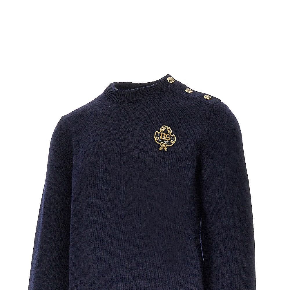 Wool sweater with embroidered patch
