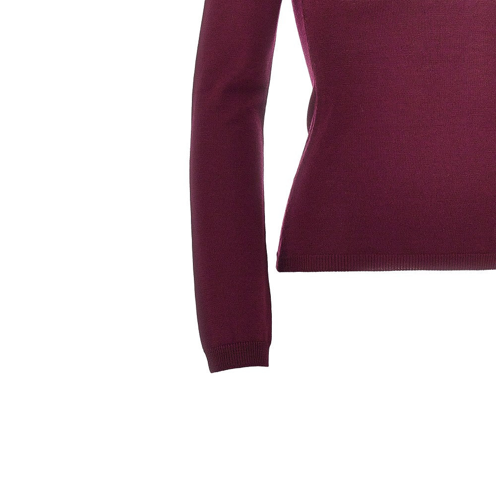 Pullover in lana con taglio sul retro