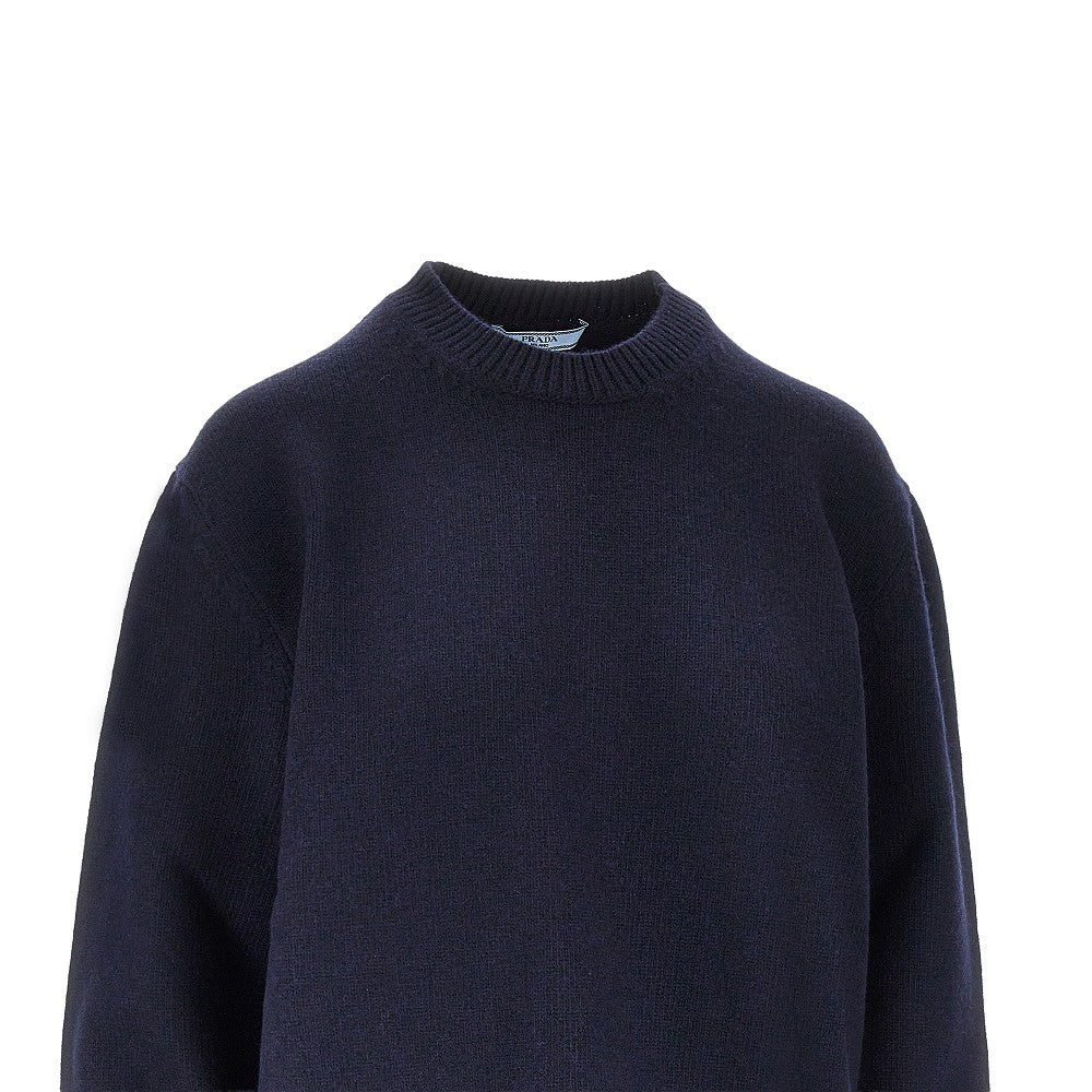 Pullover in lana con toppe in pelle