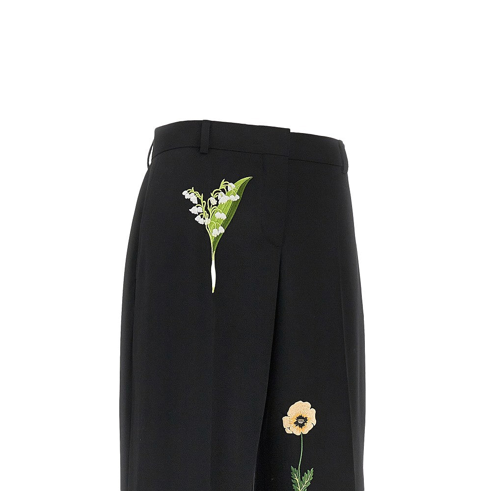 Wool pants with embroidered flowers