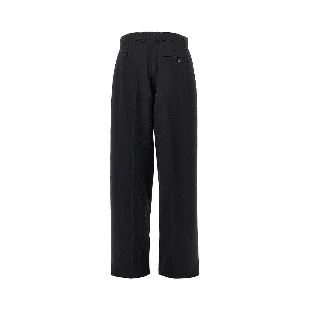 Wool pants with embroidered flowers