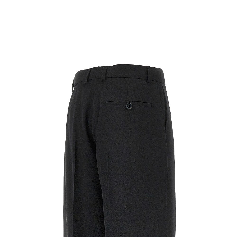 Wool pants with embroidered flowers