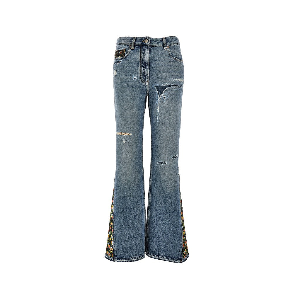 Flared jeans with floral details