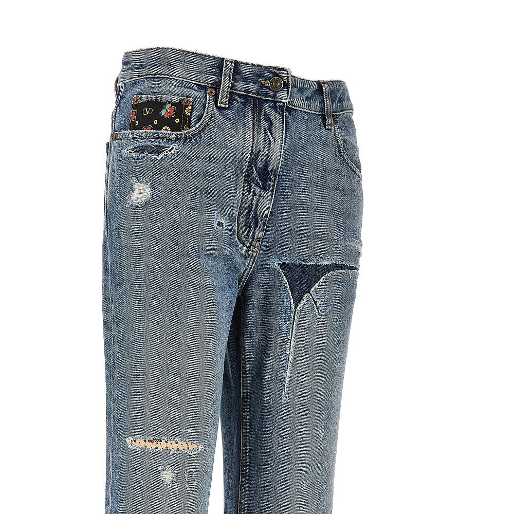 Flared jeans with floral details