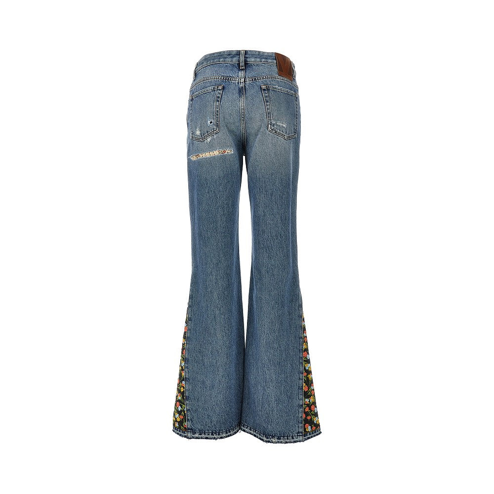 Flared jeans with floral details