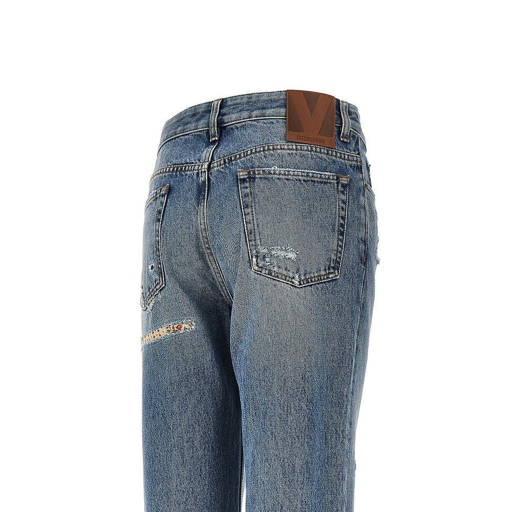 Flared jeans with floral details