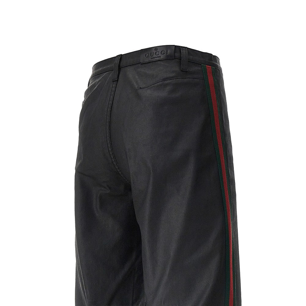 Pantalone in twill spalmato con bande Web