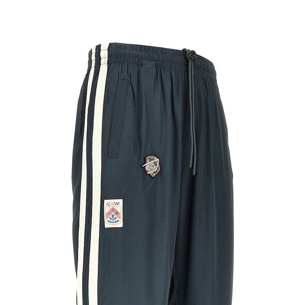 Track pants in raso con patches