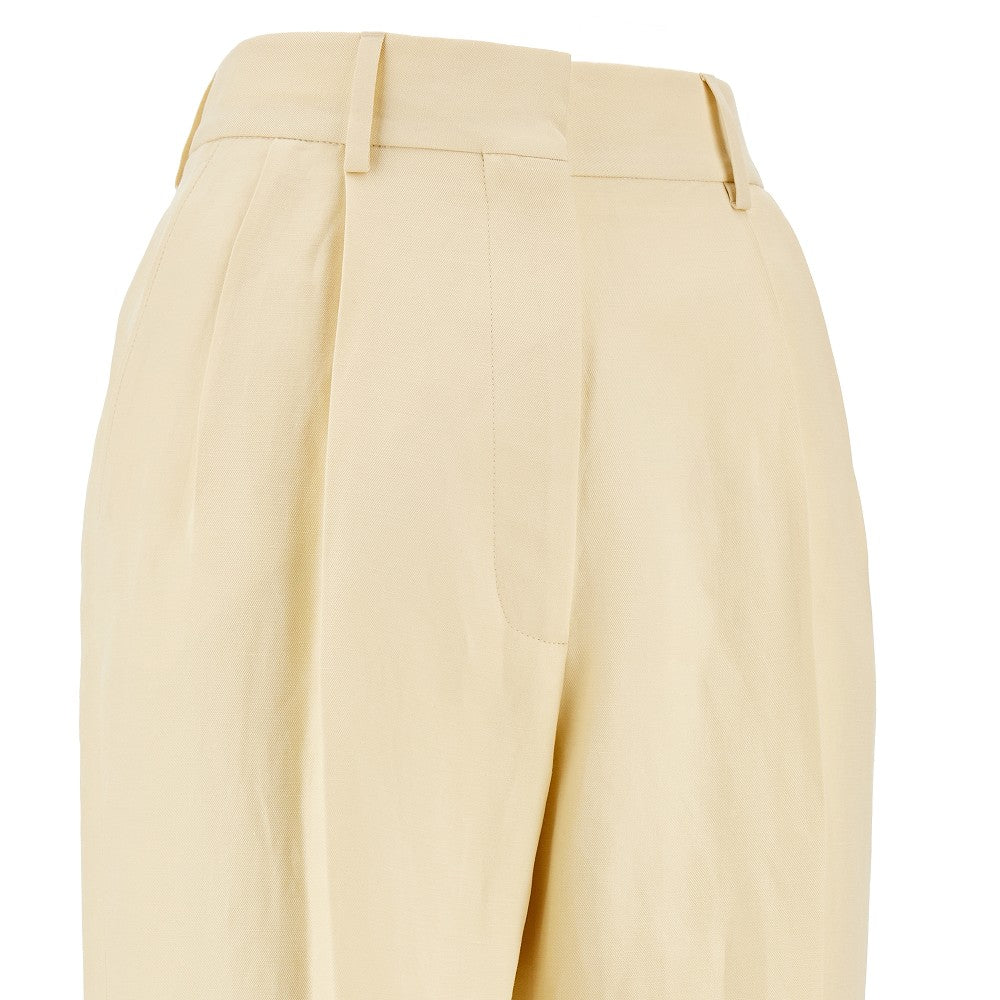 Pantalone in lino e seta con pince