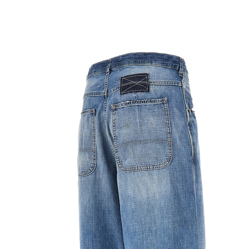 Jeans a gamba ampia in denim slavato